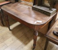 A pair of Regency mahogany 'D' shaped dining table ends, with ring turned legs and fitted brass