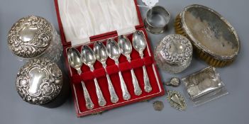 A cased set of six silver teaspoons and other items including silver mounted toilet jars, coins