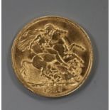 A George V 1913 gold full sovereign.