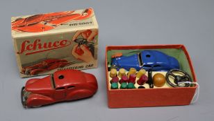 A Schuco Telesteering Car 3000 with instructions and box and another with incomplete accessories