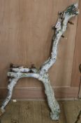 A pair of cast iron rustic garden bench ends