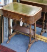 A walnut occasional table, with book rack understage W.55cm