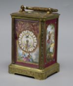 An ornate enamel faced timepiece height 12cm