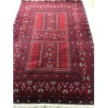 A Persian Tabriz style red ground carpet 252 x 173cm