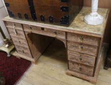 A late Victorian carved oak pedestal desk W.130cm