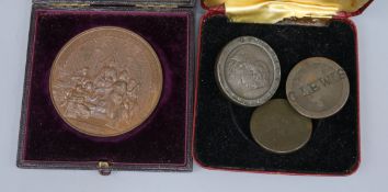A cased medallion and a 1797 2d and two other coins