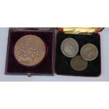 A cased medallion and a 1797 2d and two other coins