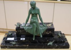 A French bronze of a woman and doves, on a marble base height 32cm