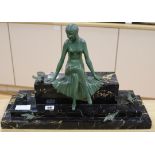 A French bronze of a woman and doves, on a marble base height 32cm