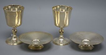 A pair of silver circular silver tazzas, Adie Bros. Birmingham 1946 and a pair of silver goblets,