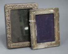 An Edwardian silver photograph frame, A & J Zimmerman, Birmingham, 1904 and one other plated