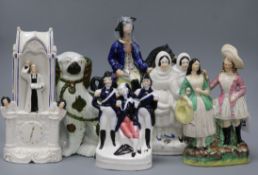 A group of six Staffordshire pottery groups tallest 29.5cm