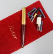A Cartier gold plated fountain pen with faux shaft no.022649, unboxed