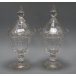 A pair of Regency style lidded glass vases height 35cm