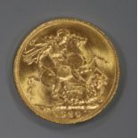 A 1920 gold full sovereign.