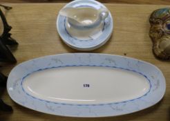 William P. Robins for Clarice Cliff. A dolphin designed Bizarre part dinner service longest 57.5cm