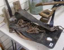 A small collection of iron hames, harness, etc.