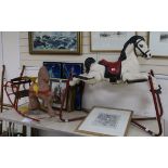 Two children's 1940's-50's painted tin rocking / bouncing horses