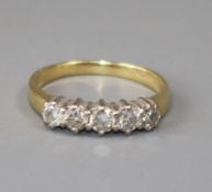 A modern 18ct gold and five stone diamond ring, size I.