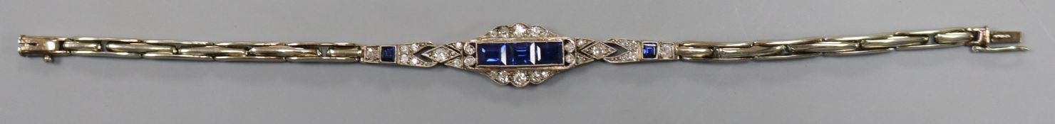 A 1930's/1940's? 18ct white gold, sapphire and diamond set expanding bracelet, 15.5cm.