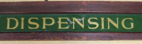 An early 20th century dispensing department sign length 180cm