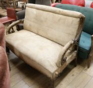 A Victorian French carved scroll arm settee W.133cm