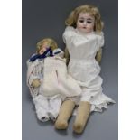 An open mouthed bisque-headed French kid bodied doll and another smaller Austrian doll