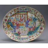 A Chinese famille rose oval dish, Jiaqing period length 40cm