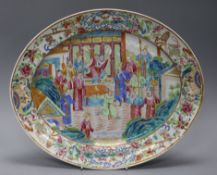 A Chinese famille rose oval dish, Jiaqing period length 40cm