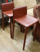 A pair of Bonaldo Italian leather bar stools