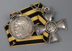 A Russian silver St George Cross no.413373 and Medal no.24124