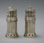 A pair of George V silver lighthouse sugar casters, Vander & Hedges (Tessier), London 1911, 15cm, 16