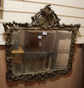 A giltwood and gesso wall mirror W.76cm
