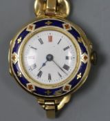 A lady's 18ct. gold and enamel wristwatch with 18ct expandable bracelet.