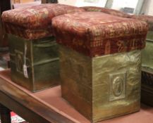 A pair of Edwardian embossed brass stools W.39cm