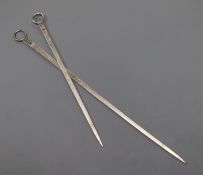 Two late 18th/early 19th century white metal skewers, both with maker's mark only IH below a pellet,