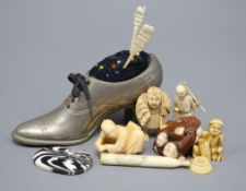 A group of Oriental ivory and bone netsuke, carvings etc and a pewter 'shoe' pin cushion