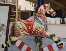 An Edwardian polychrome painted carved wood carousel horse