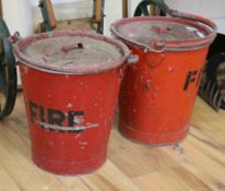 Two red painted galvanised fire buckets
