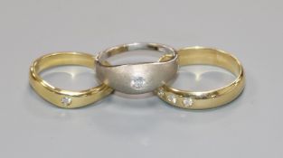 Two 18ct gold and gypsy set solitaire diamond rings including white gold and an 18ct gold and