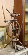 A Victorian beech spinning wheel W.34cm