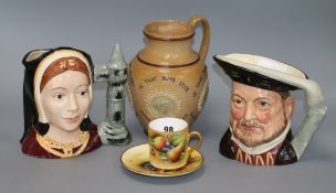 A Doulton stoneware jug, two Toby jugs and a Brookdale cup and saucer tallest 19.5cm