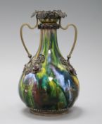 An Austro Hungarian enamelled white metal vase with jewelled decoration