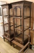 A pair of carved display cabinets W.70.5cm