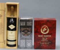 One cased bottle of Chateau de Laubade Armagnac 1923, a boxed bottle of Remy Martin XO Special