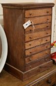 A pine nest of eight small drawers W.37cm