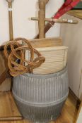 A galvanised tin wash barrel, a washing dolly and two wash boards