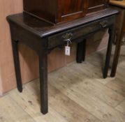 An 18th century oak side table W.85cm