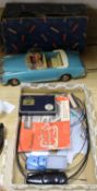 A Schuco Varianto racing game and a boxed Tippco TCO-112 Mercedes toy car