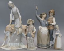 A Lladro group, 'Folk Dancing', No. 5256 and three other figures, including Lladro 'Going